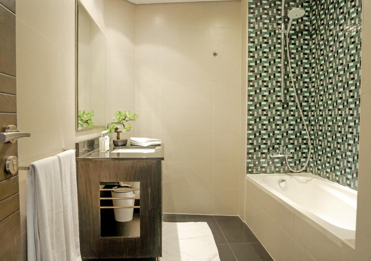 Nasma Luxury Stays - Cayan Tower Dubaï Extérieur photo